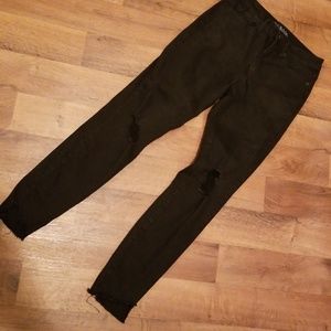 Lightly distressed black jeans